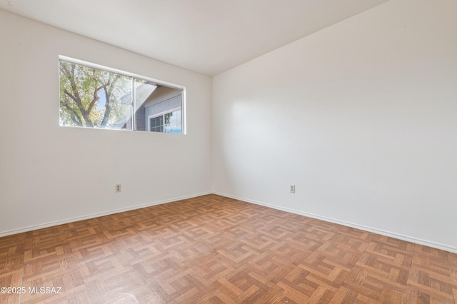 empty room with parquet floors