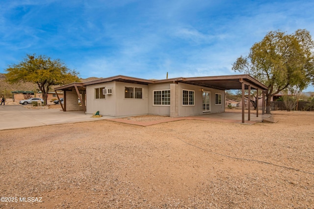 rear view of property with a patio