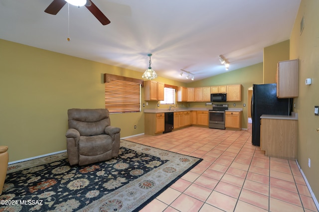 kitchen with light brown cabinets, lofted ceiling, track lighting, black appliances, and light tile patterned floors