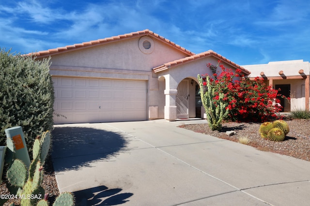 view of front of home with a garage