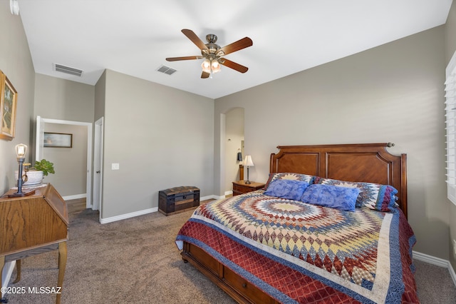 bedroom featuring ceiling fan and carpet