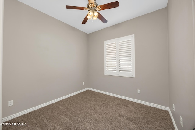 unfurnished room featuring ceiling fan and carpet flooring