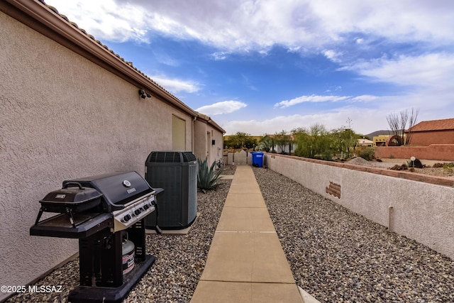 view of side of property featuring cooling unit