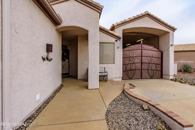 doorway to property featuring a patio area