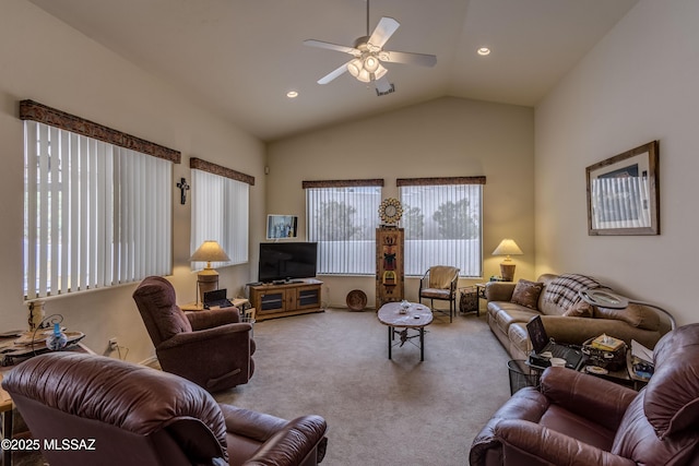 living room with high vaulted ceiling, light carpet, and ceiling fan