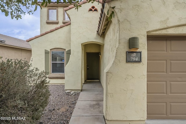 entrance to property with a garage