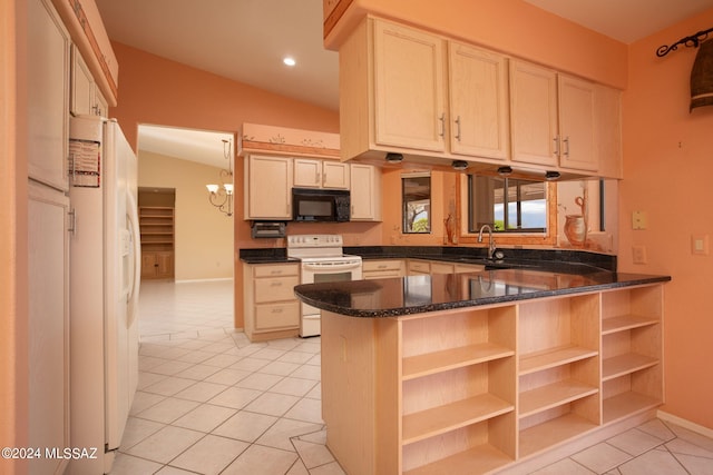 kitchen featuring sink, kitchen peninsula, lofted ceiling, white appliances, and light tile patterned floors