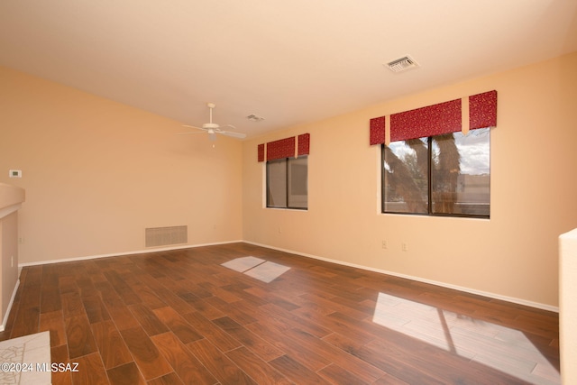 spare room featuring ceiling fan and wood-type flooring