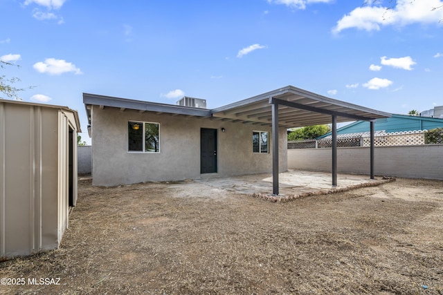 rear view of property with a patio area