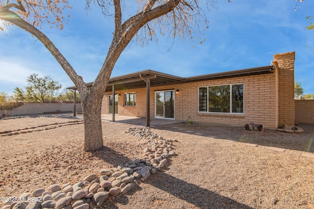 rear view of house with a patio area