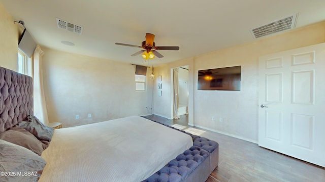 bedroom featuring hardwood / wood-style floors and ceiling fan