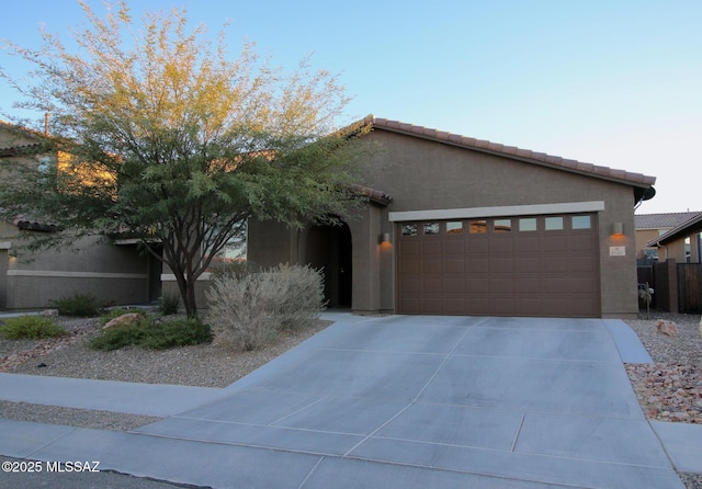 view of front of home with a garage