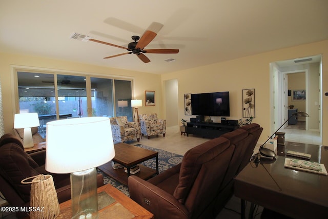 living room featuring ceiling fan