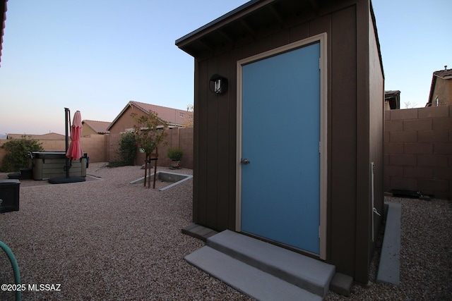 view of outdoor structure at dusk