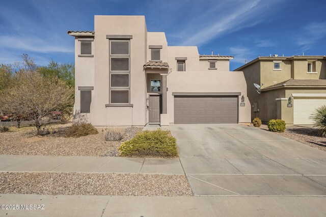 view of front of property featuring a garage