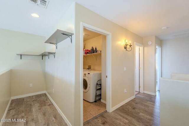 hallway featuring hardwood / wood-style floors