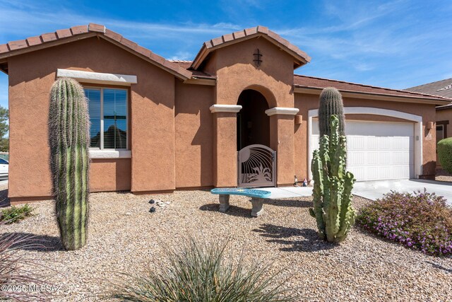 ranch-style house with a garage