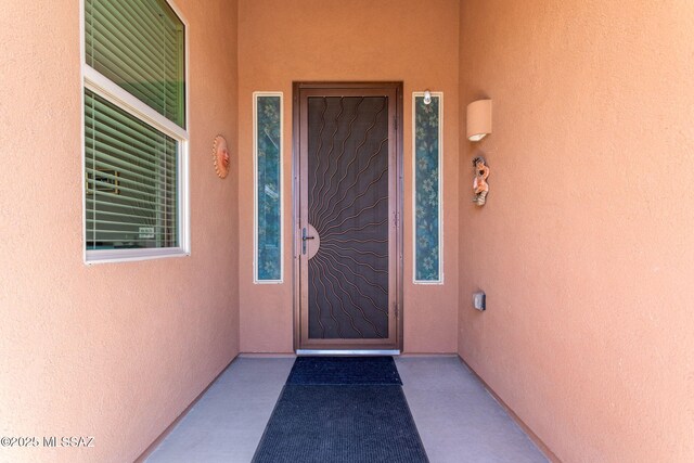 entrance foyer with light tile patterned floors