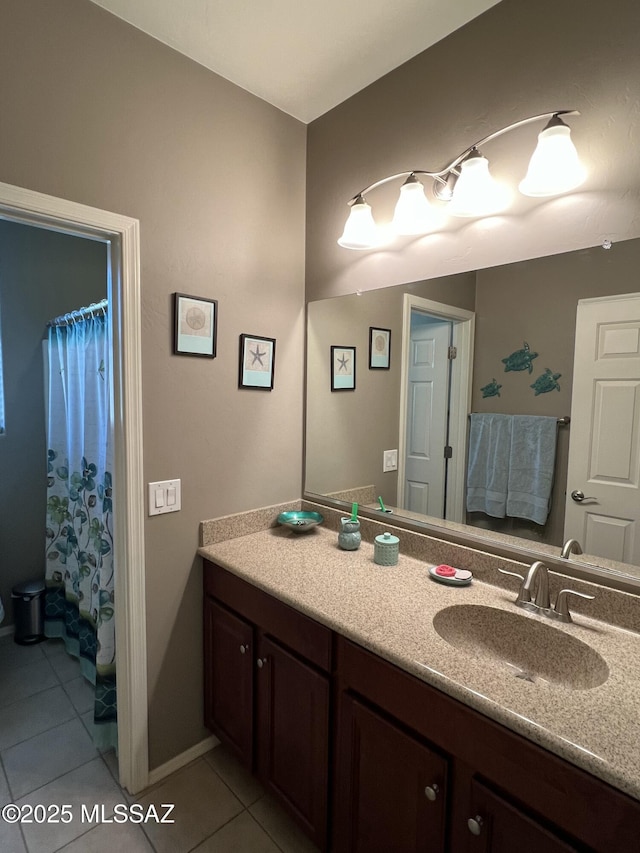 full bath featuring tile patterned flooring, vanity, and a shower with curtain