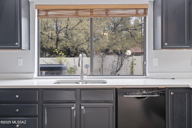 kitchen featuring black dishwasher and sink