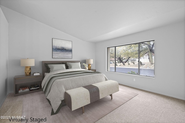 bedroom featuring light colored carpet and lofted ceiling