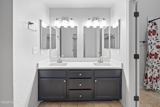 bathroom featuring vanity and walk in shower