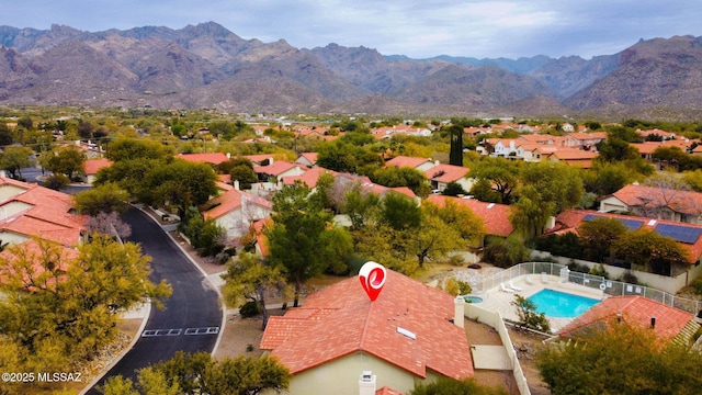 drone / aerial view featuring a mountain view