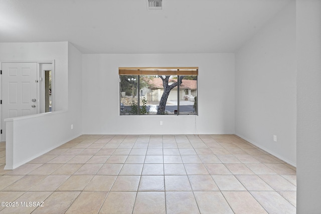 view of tiled spare room