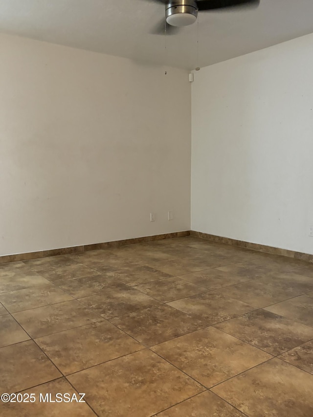 unfurnished room with ceiling fan