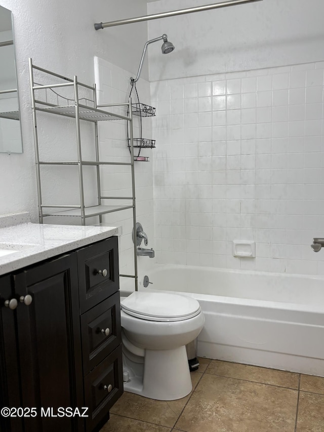 full bathroom featuring shower / bathtub combination, vanity, toilet, and tile patterned flooring