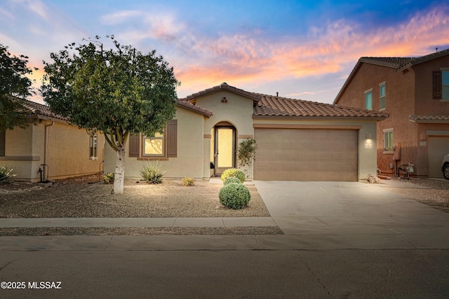 view of front of property featuring a garage