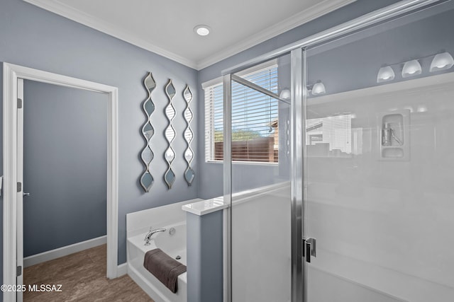 bathroom featuring separate shower and tub and crown molding