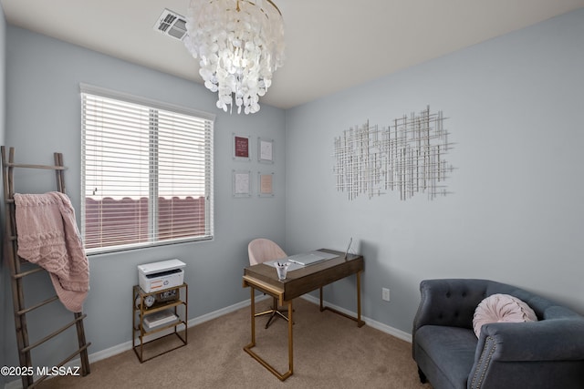 carpeted office space featuring an inviting chandelier