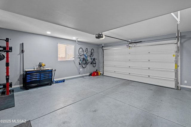 garage featuring a garage door opener