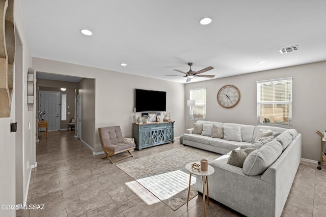 living room featuring ceiling fan