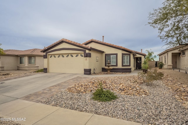 ranch-style home featuring a garage