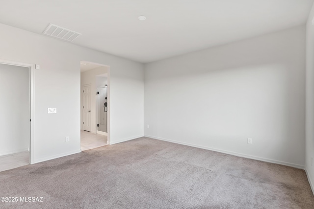 view of carpeted spare room