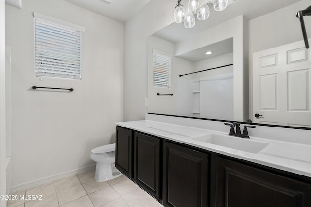 bathroom with tile patterned floors, a shower, vanity, and toilet