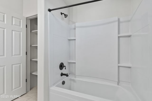 bathroom with shower / bathing tub combination and tile patterned floors