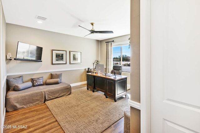 office area featuring hardwood / wood-style flooring and ceiling fan