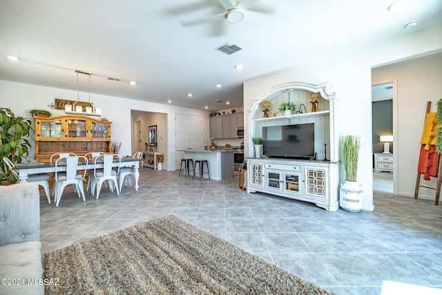 living room featuring ceiling fan