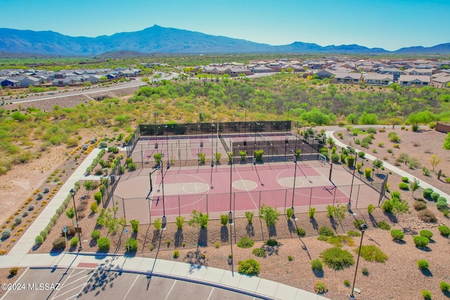 birds eye view of property featuring a mountain view