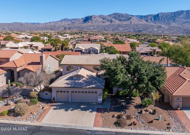 birds eye view of property featuring a residential view and a mountain view