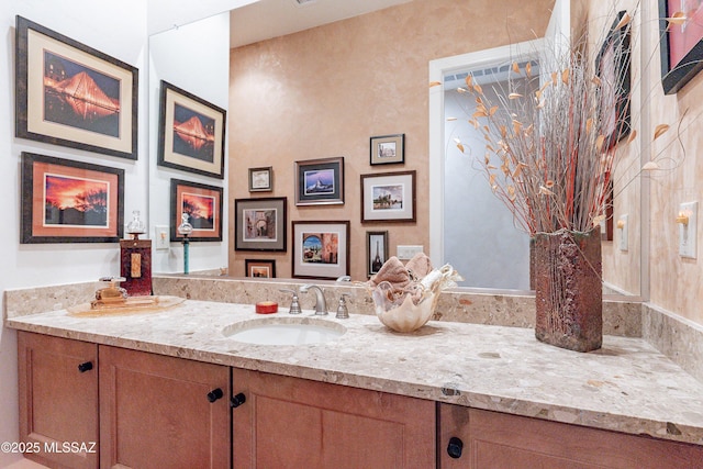 bathroom featuring vanity