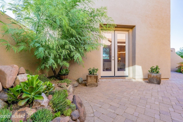 doorway to property featuring french doors and a patio