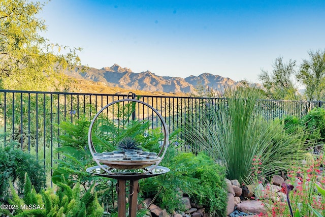 balcony featuring a mountain view