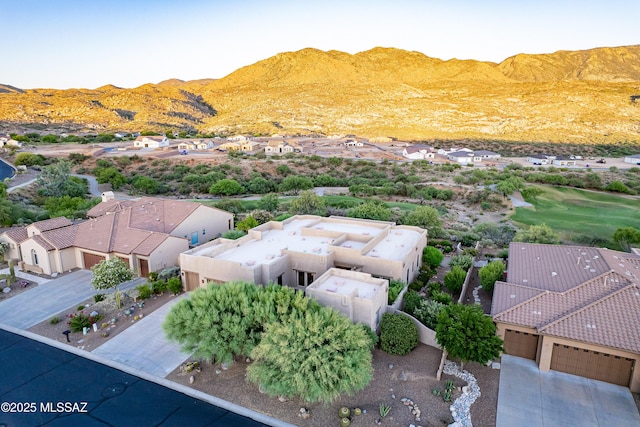 drone / aerial view featuring a mountain view