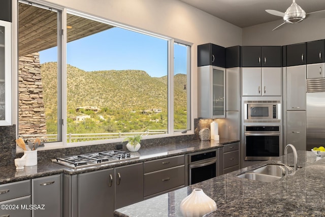 kitchen featuring sink, plenty of natural light, and appliances with stainless steel finishes