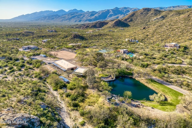 bird's eye view featuring a water and mountain view