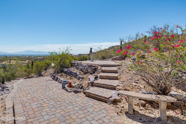 view of patio featuring a mountain view